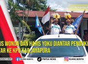 Yunus Wonda dan Haris Yoku diantar Pendukung daftar Ke KPU Kabupaten Jayapura