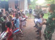Tebar Kepedulian Bantu Anak-anak dengan Perlengkapan Sekolah, Wujud Pegabdian Satgas Yonif 512/QY di Distrik Senggi